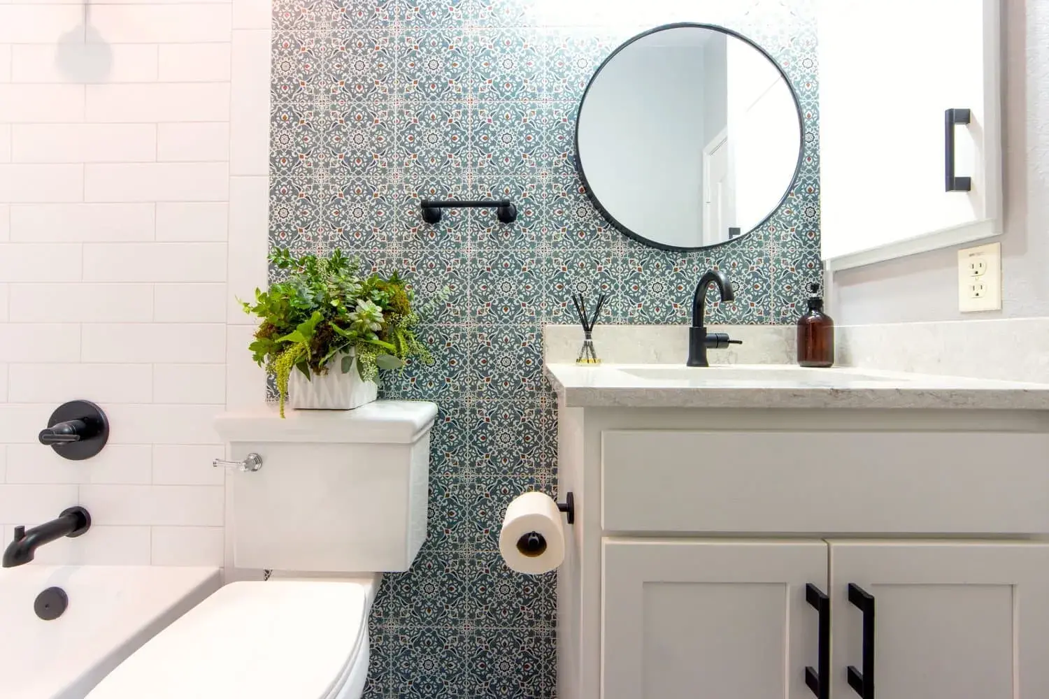 San Diego bathroom before remodel with dated fixtures and tile
